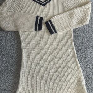 Elegant Cream Sweater with Navy Accents